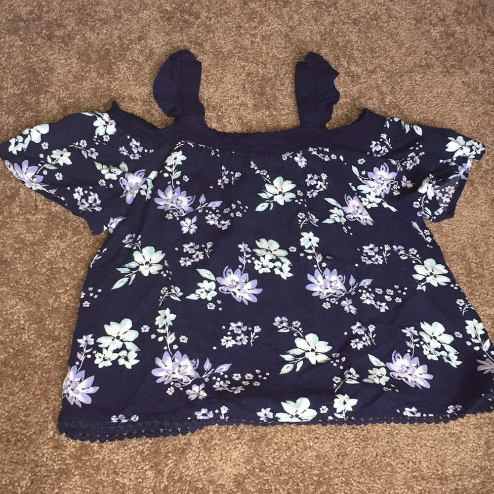 A blue flowy blouse